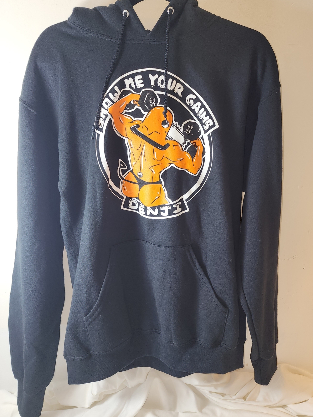 Black Hoodie with Orange Graphic Print